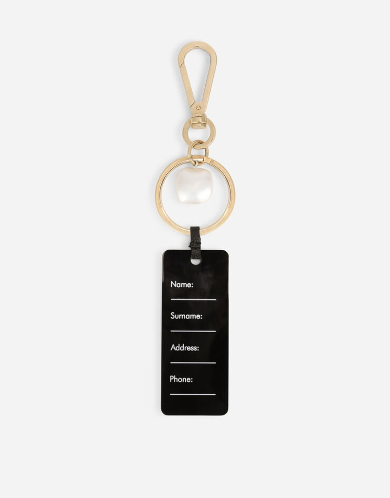 Dolce & Gabbana Metal keychain with tag and branded pearl outlook