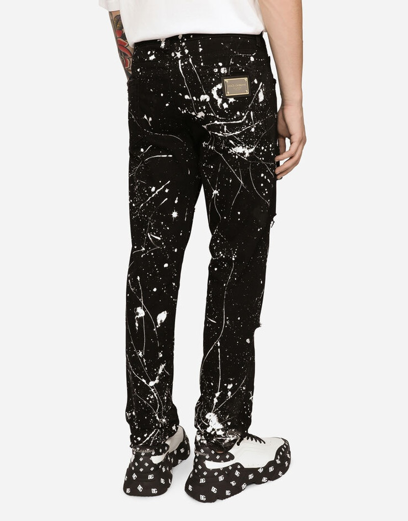 Skinny stretch jeans with rips and splash design 5