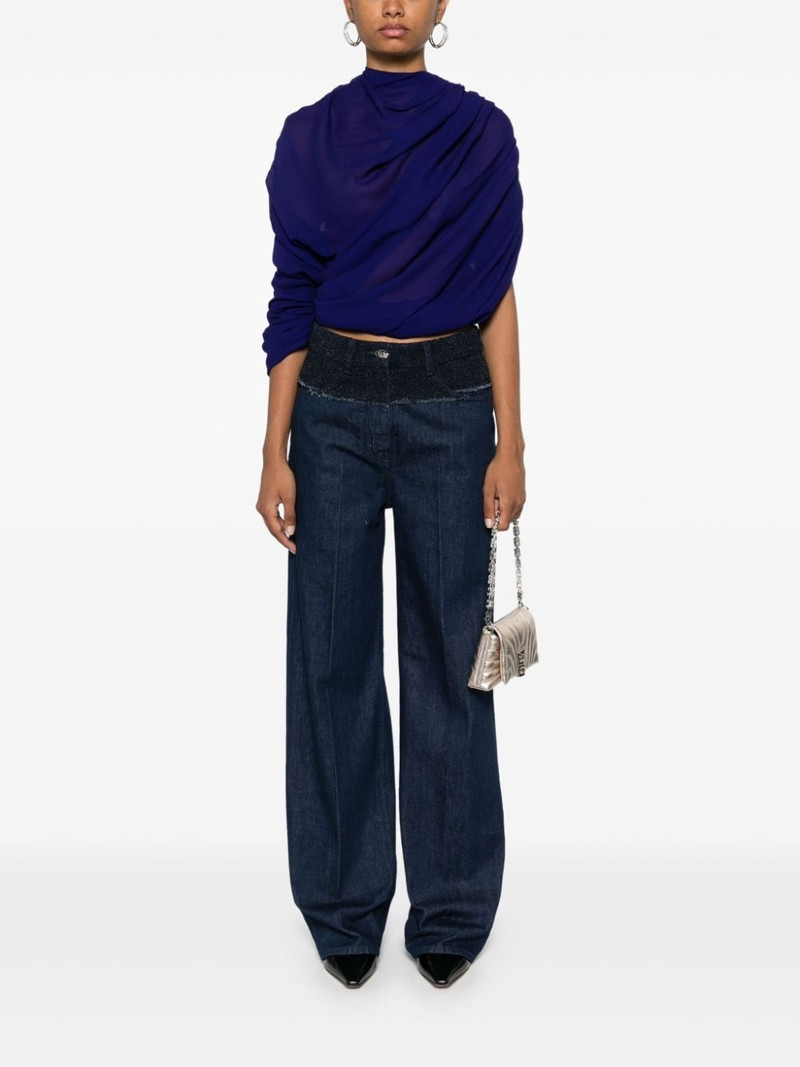 Givenchy bouclé-panelled jeans outlook