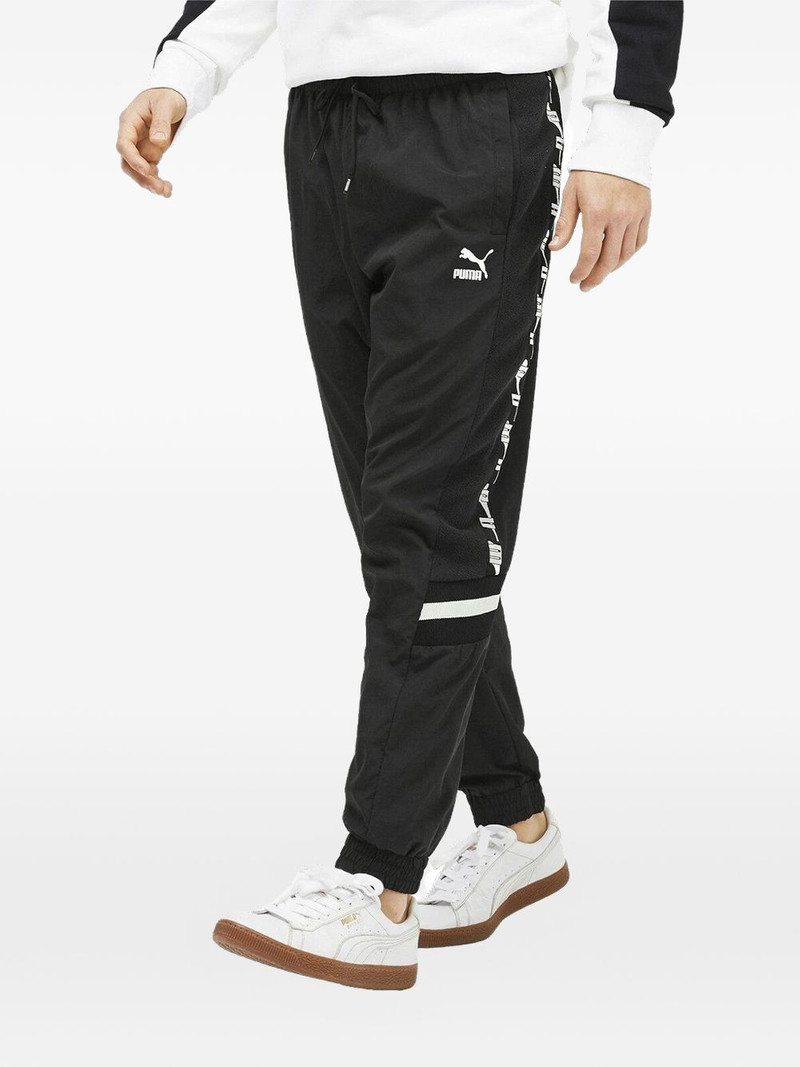 PUMA logo-pirnt track pants outlook
