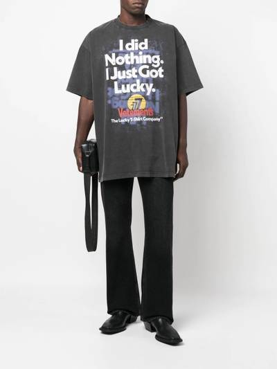 VETEMENTS slogan-print T-shirt outlook