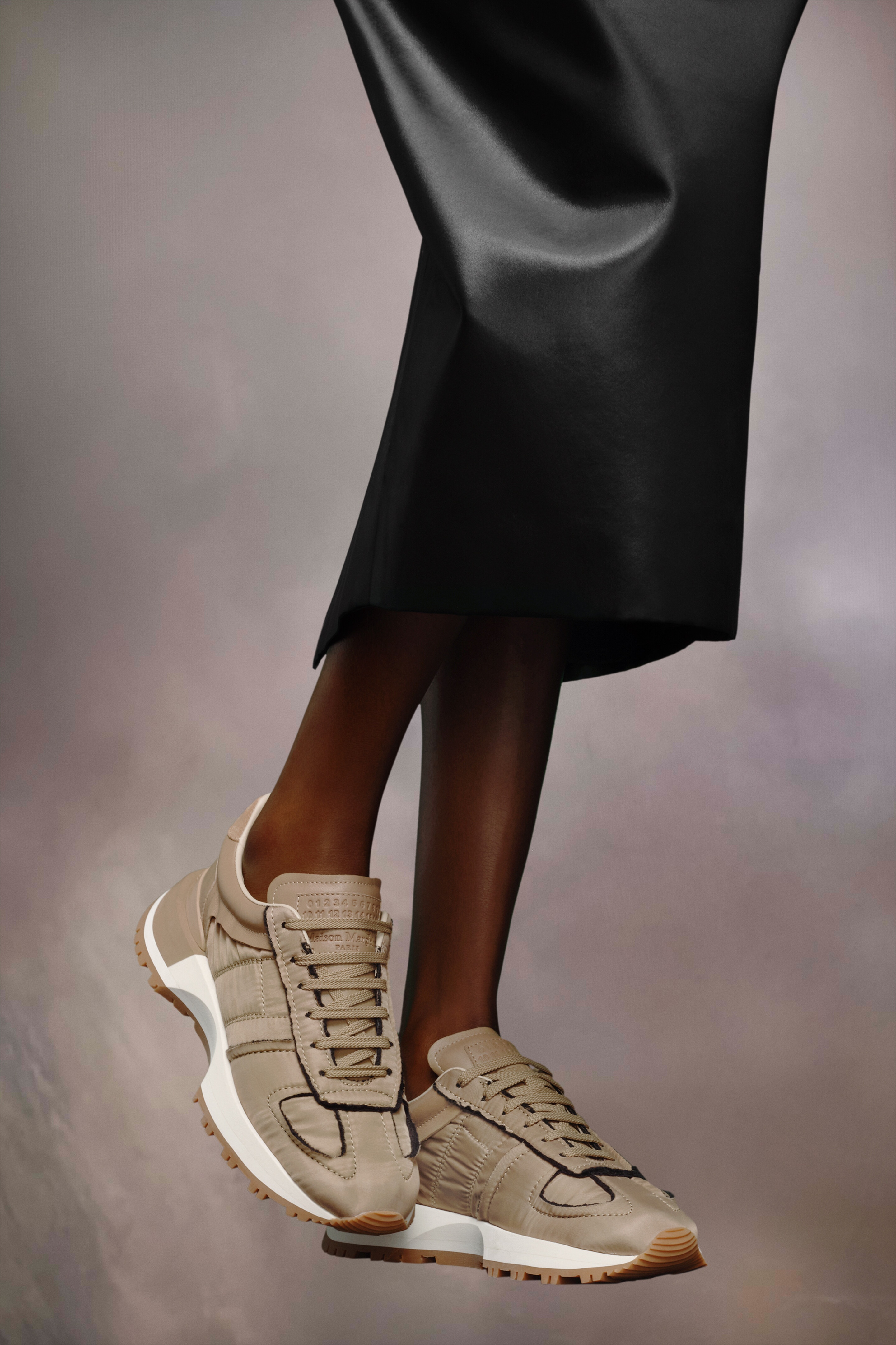 Maison Margiela 50 50 Sneaker in Black | FWRD