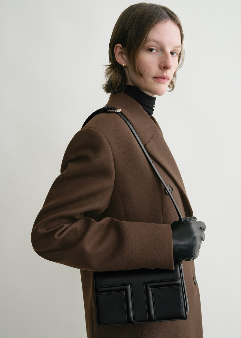 Totême Mini T-Flap leather bag black outlook