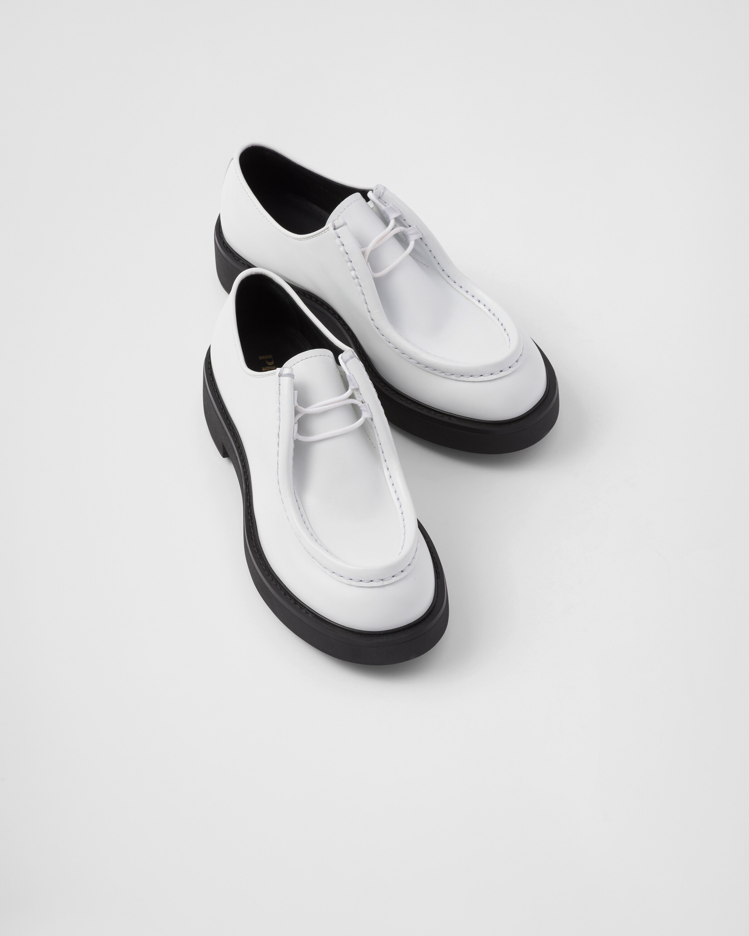 Prada Diapason opaque brushed leather lace-up shoes | REVERSIBLE