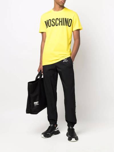 Moschino side-logo tapered trousers outlook