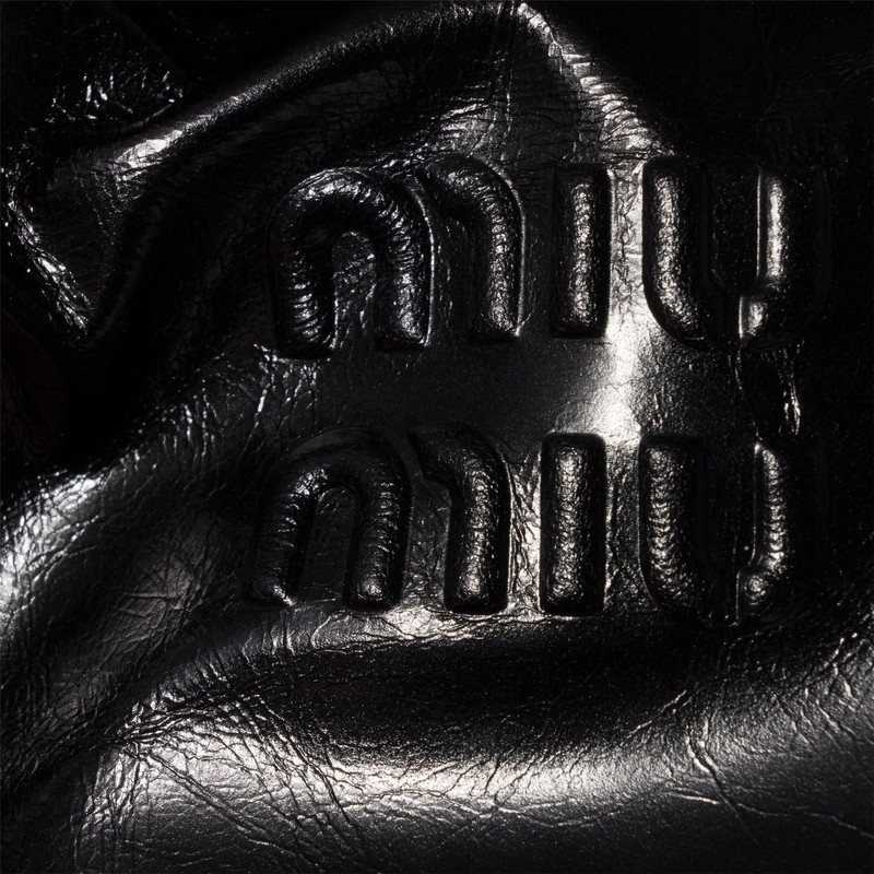 Shiny leather handbag 5