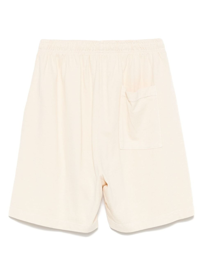 Sporty & Rich NY 94 track shorts outlook