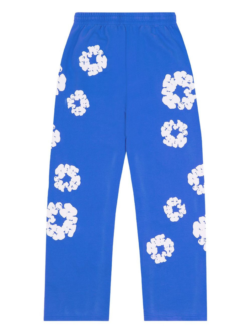 DENIM TEARS wreath-print track pants outlook