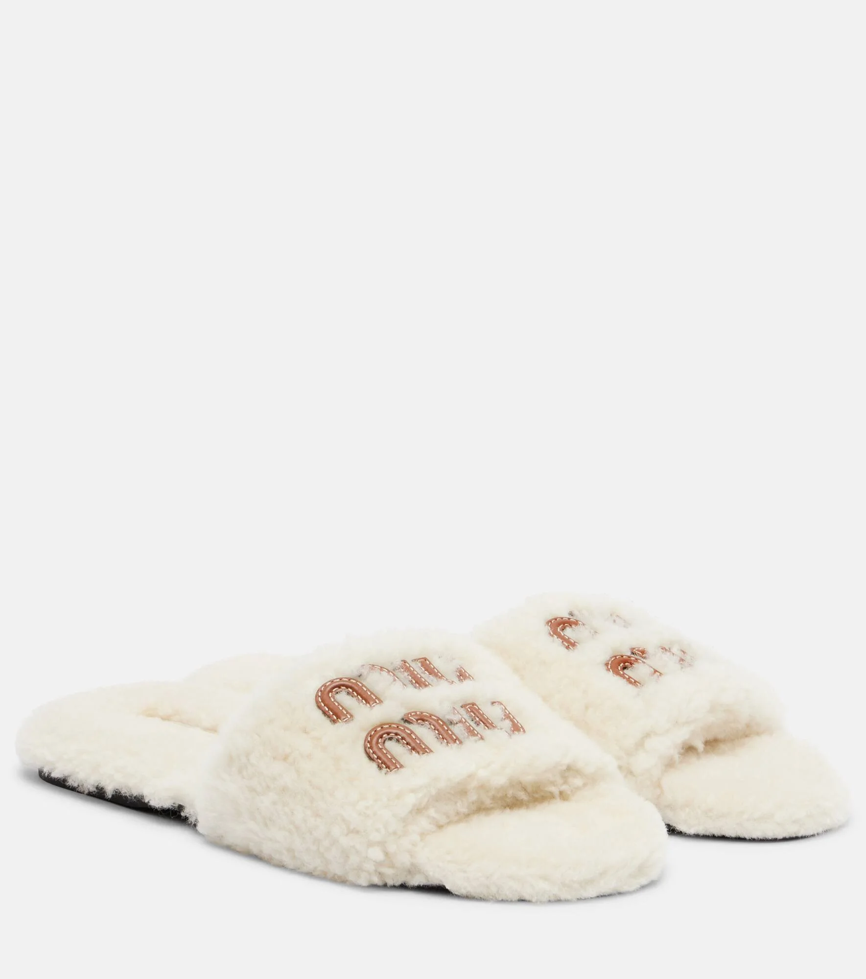 Logo leather-trimmed shearling slides - 1