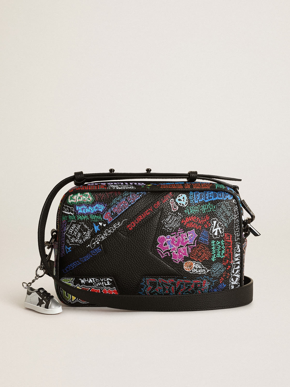 Star Bag in black hammered leather with black leather star and all-over multicolored print - 1