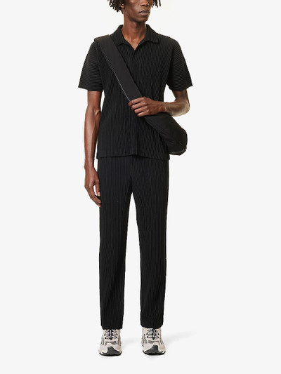 ISSEY MIYAKE Pleated tapered-leg regular-fit knitted trousers outlook