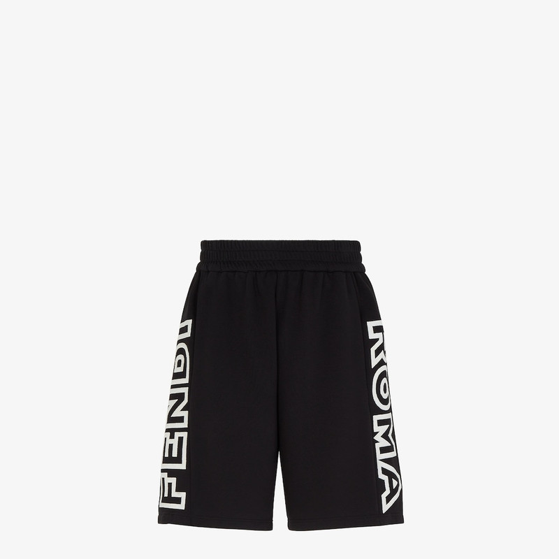 Shorts with an elastic waist and side inset pockets. Made of black jersey. Customized with side stri 1