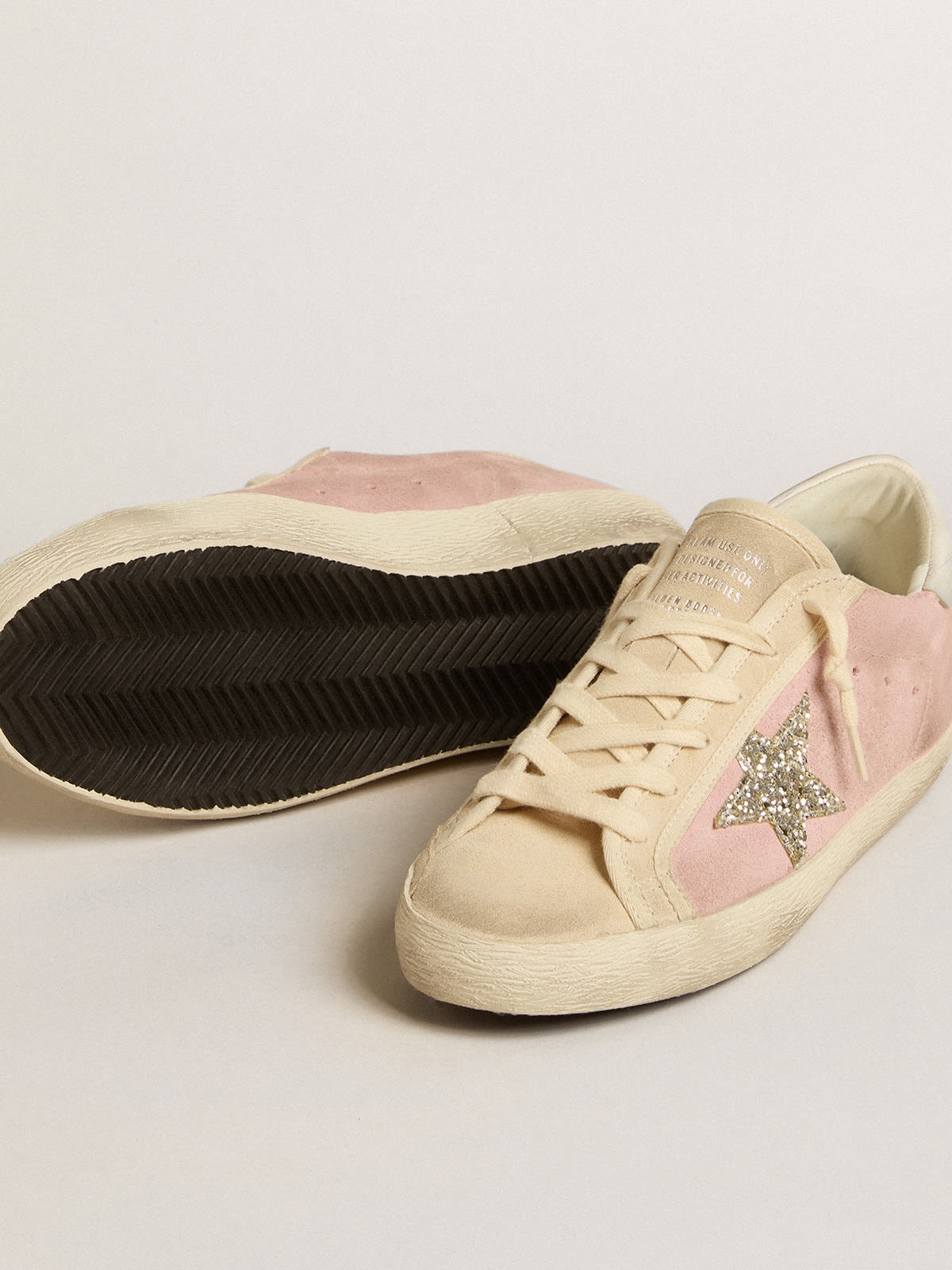 Golden Goose Super Star LTD in pink and pearl suede with platinum glitter star REVERSIBLE