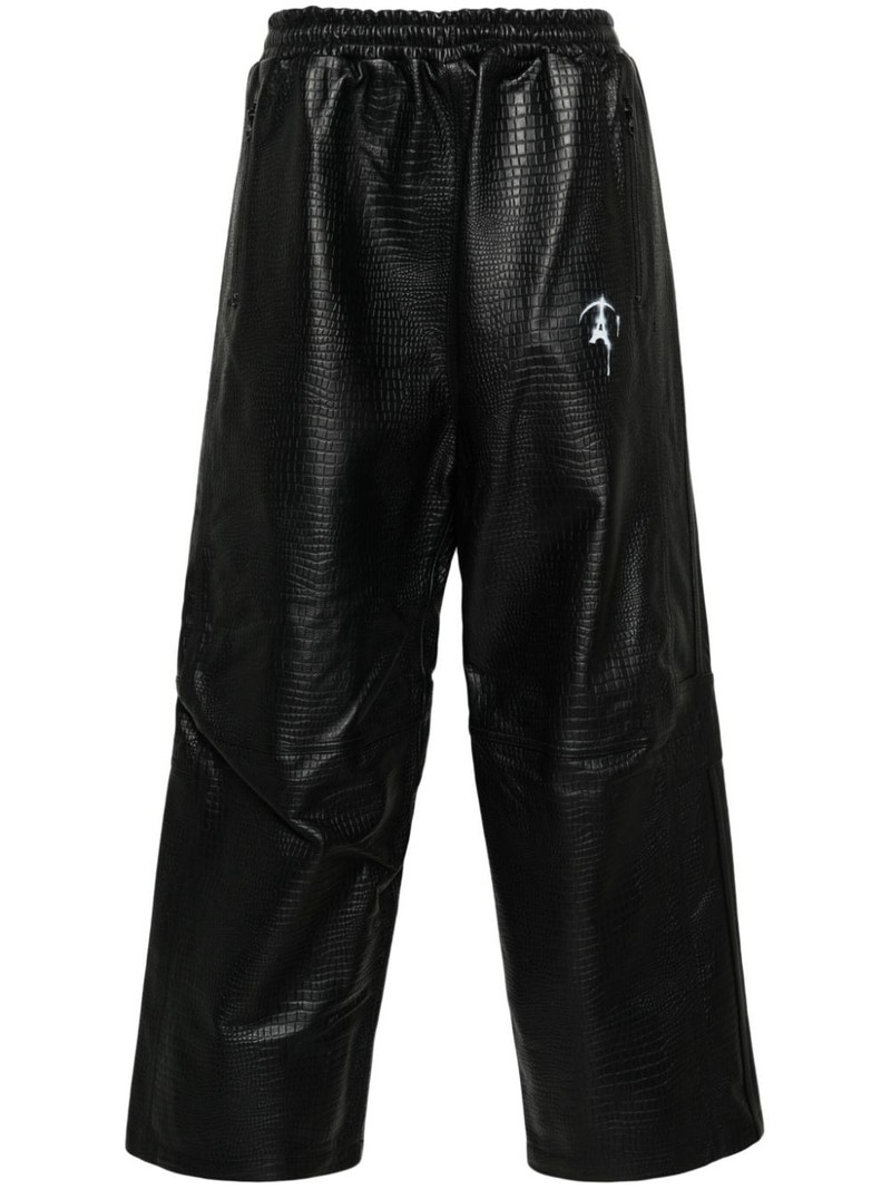 crocodile-pattern leather track pants 1