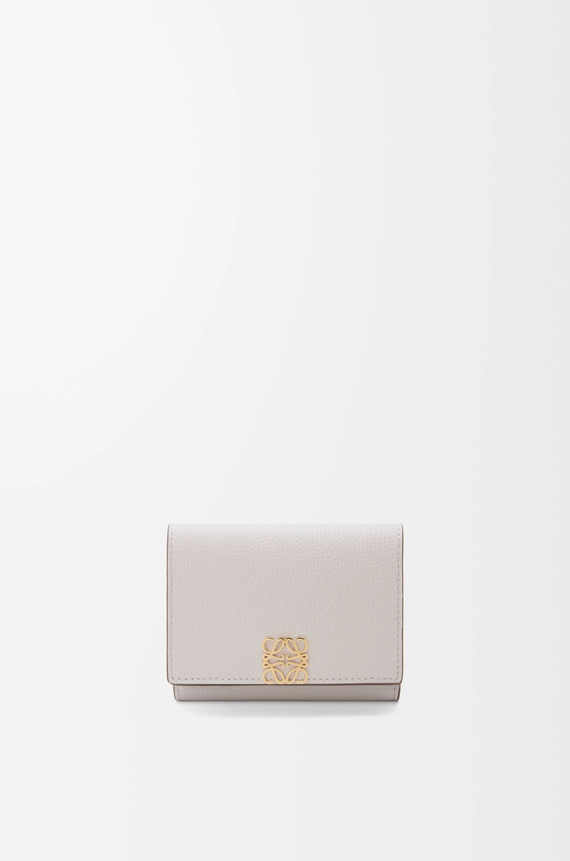 Anagram trifold wallet in pebble grained calfskin - 1