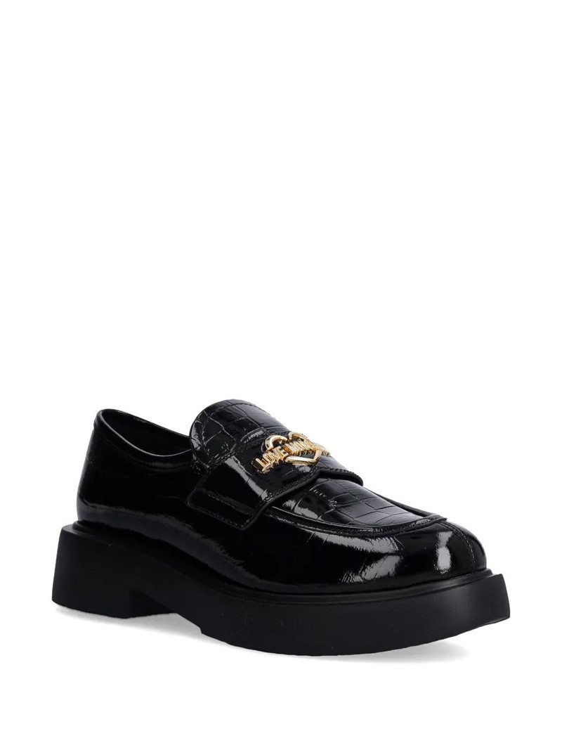 Moschino logo-lettering loafers outlook