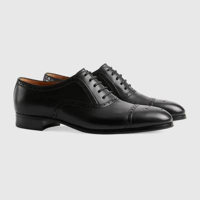 GUCCI Men's shoe with brogue details outlook