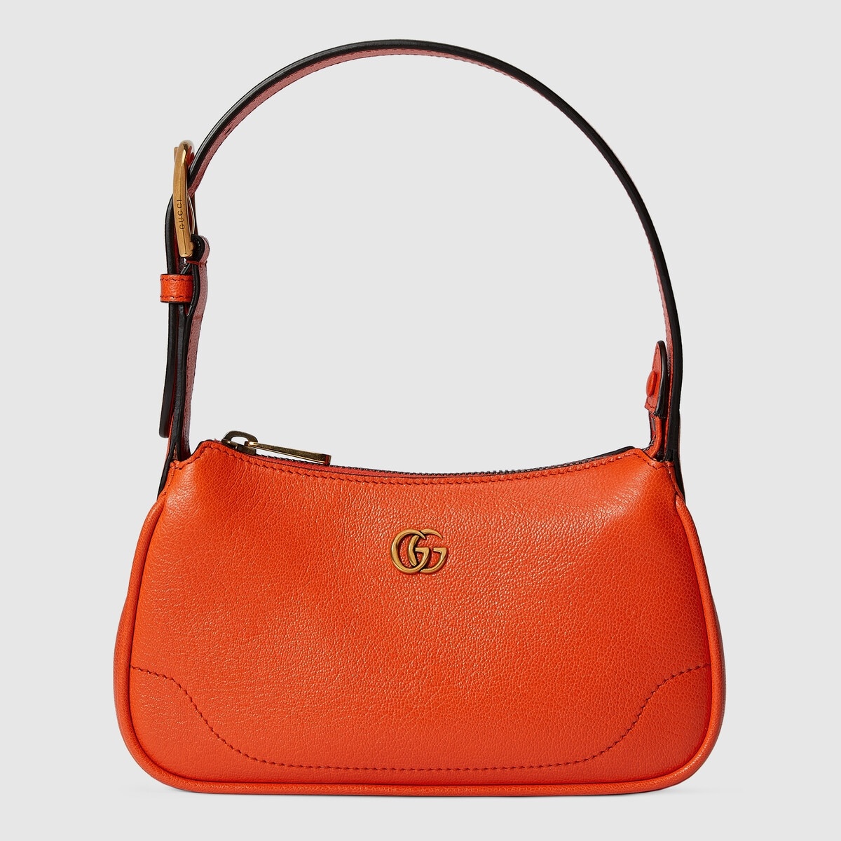 Interlocking G mini heart shoulder bag in red leather