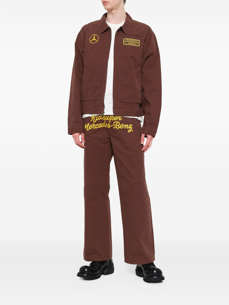 KidSuper x Mercedes Benz logo-embroidered wide-leg trousers outlook