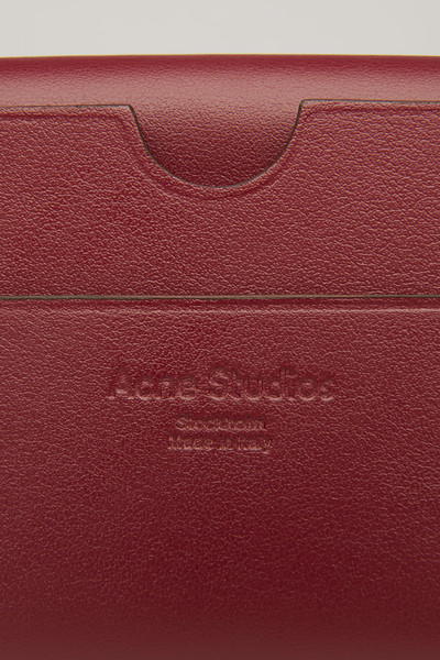 Acne Studios Bifold cardholder burgundy outlook