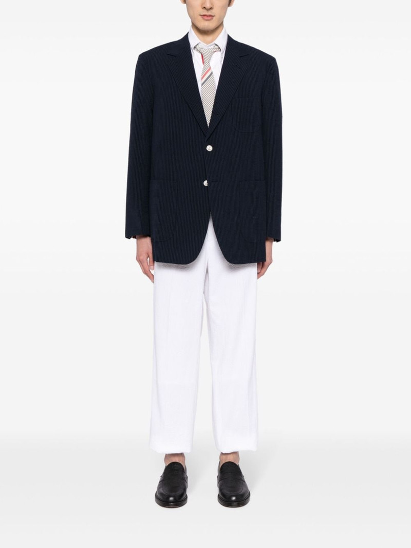 Thom Browne pressed-crease cotton trousers outlook