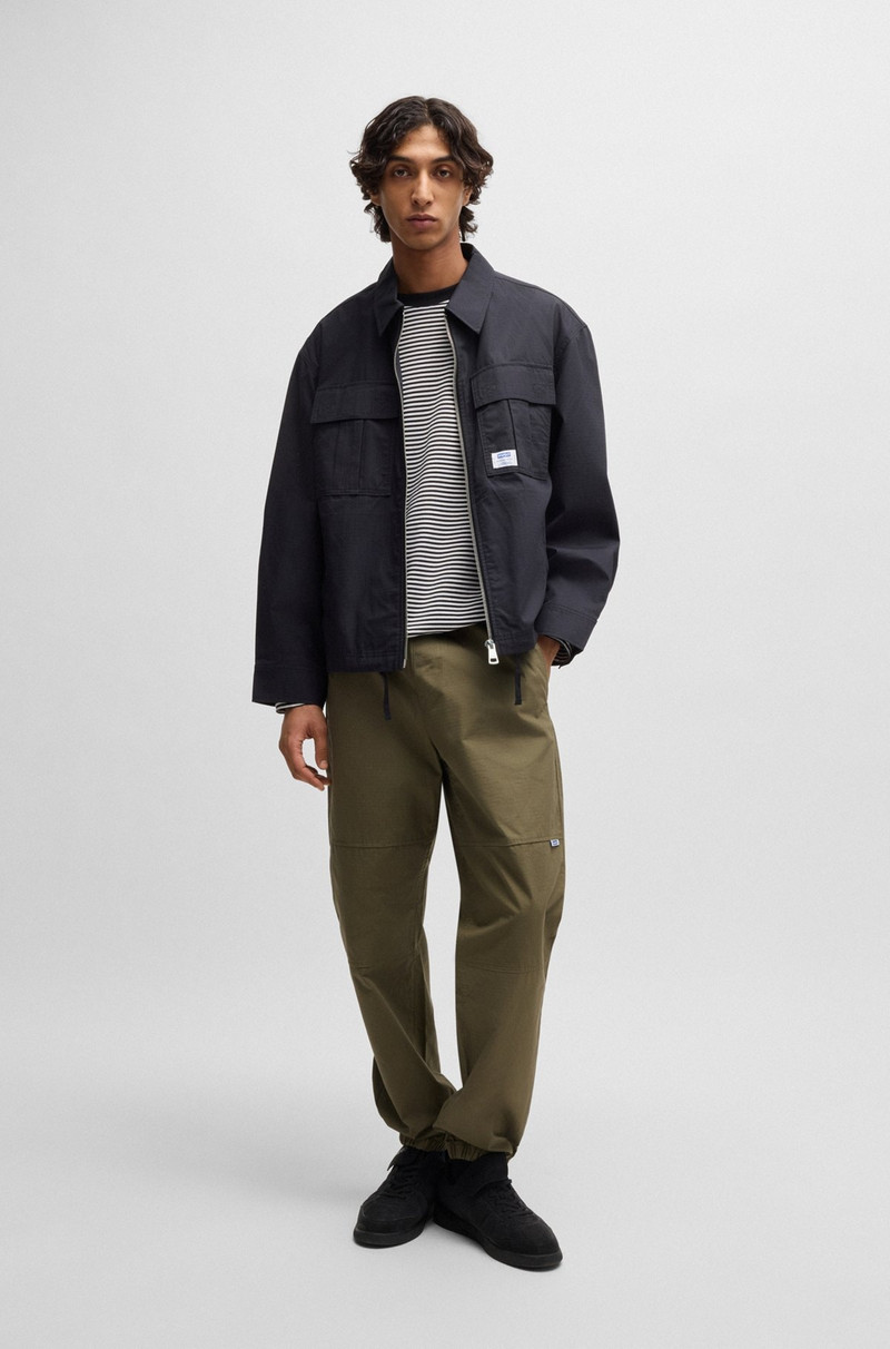 HUGO TAPERED-FIT TROUSERS IN STRUCTURED COTTON outlook