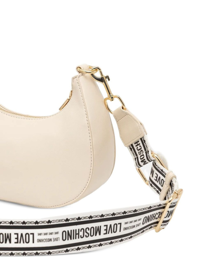 Moschino logo-embossed half-moon crossbody bag outlook