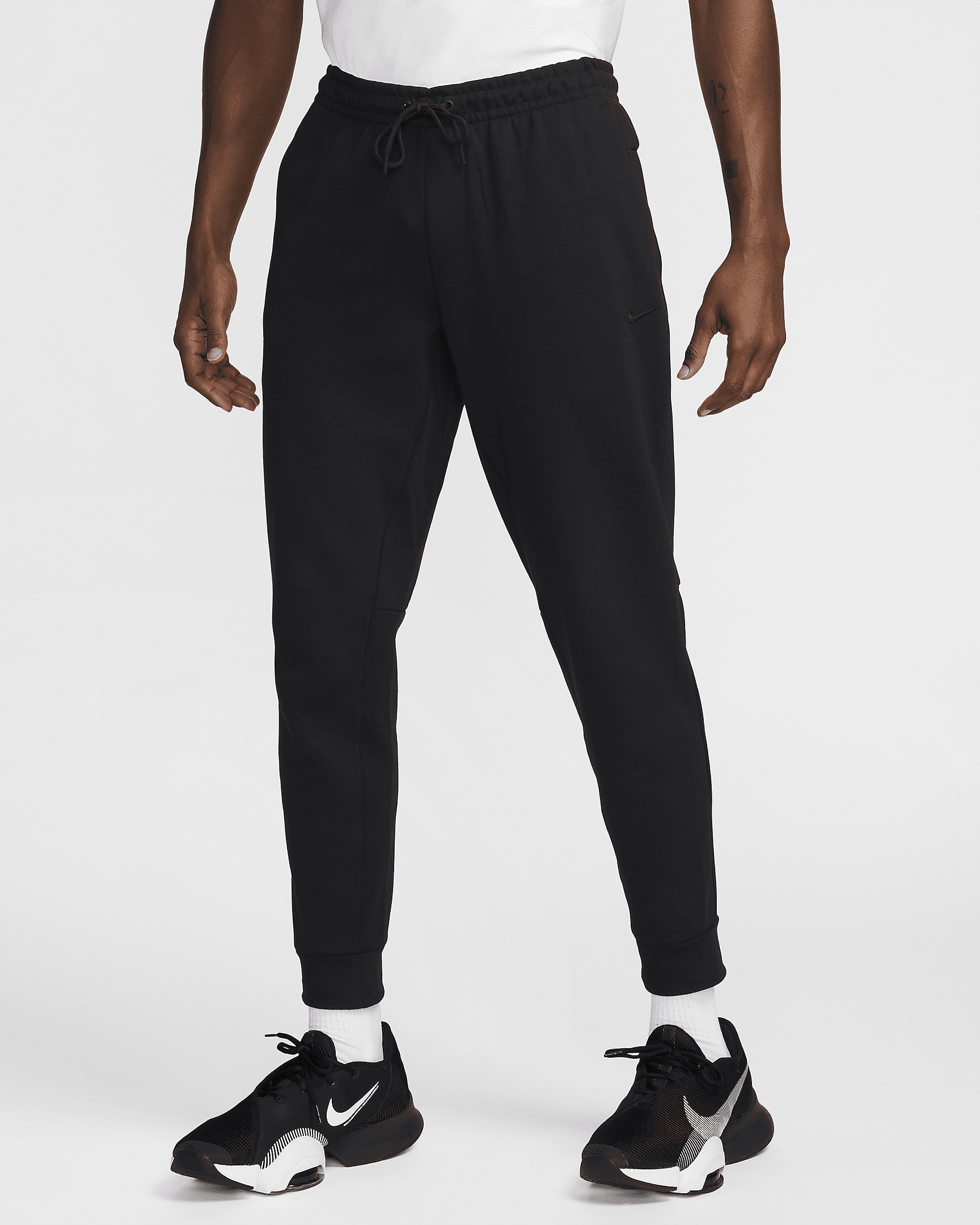 Nike Primary Men's Dri-FIT UV Versatile Joggers - 1