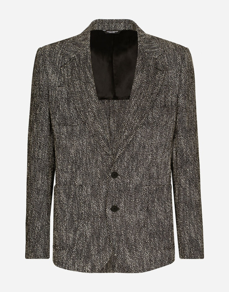 Double-breasted herringbone cotton and wool tweed jacket 1