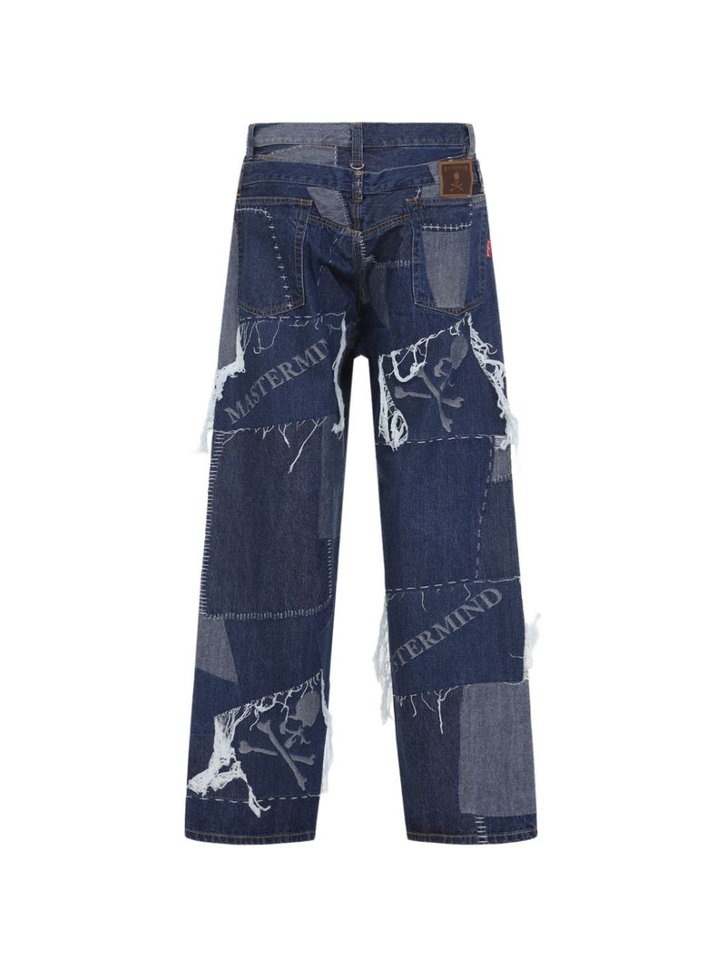 MASTERMIND WORLD patchwork distressed jeans outlook