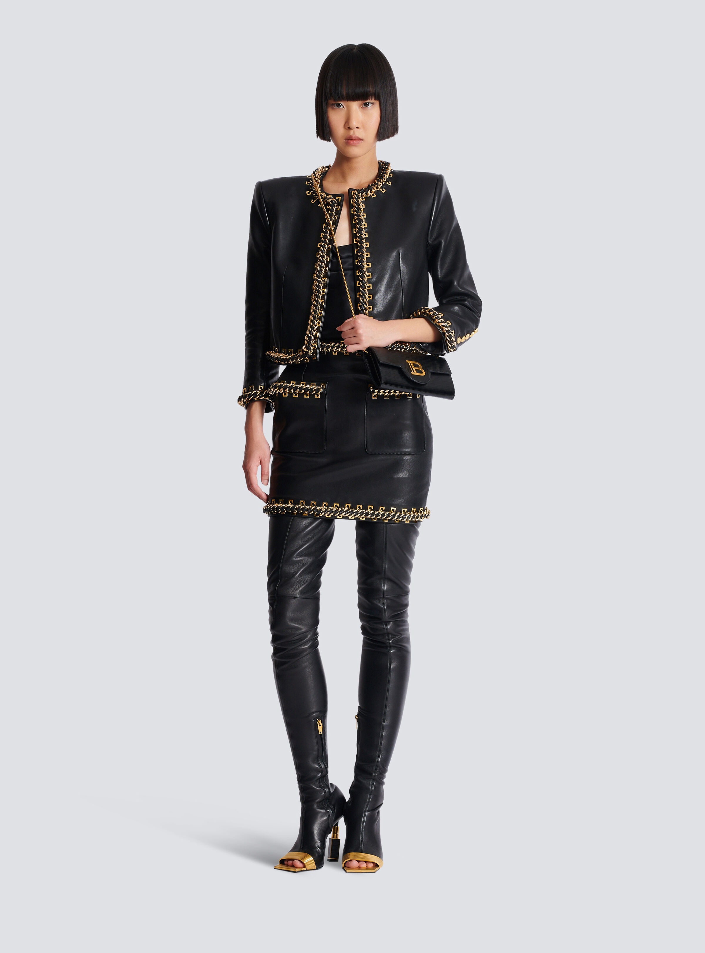 Short lambskin skirt with chains - 2