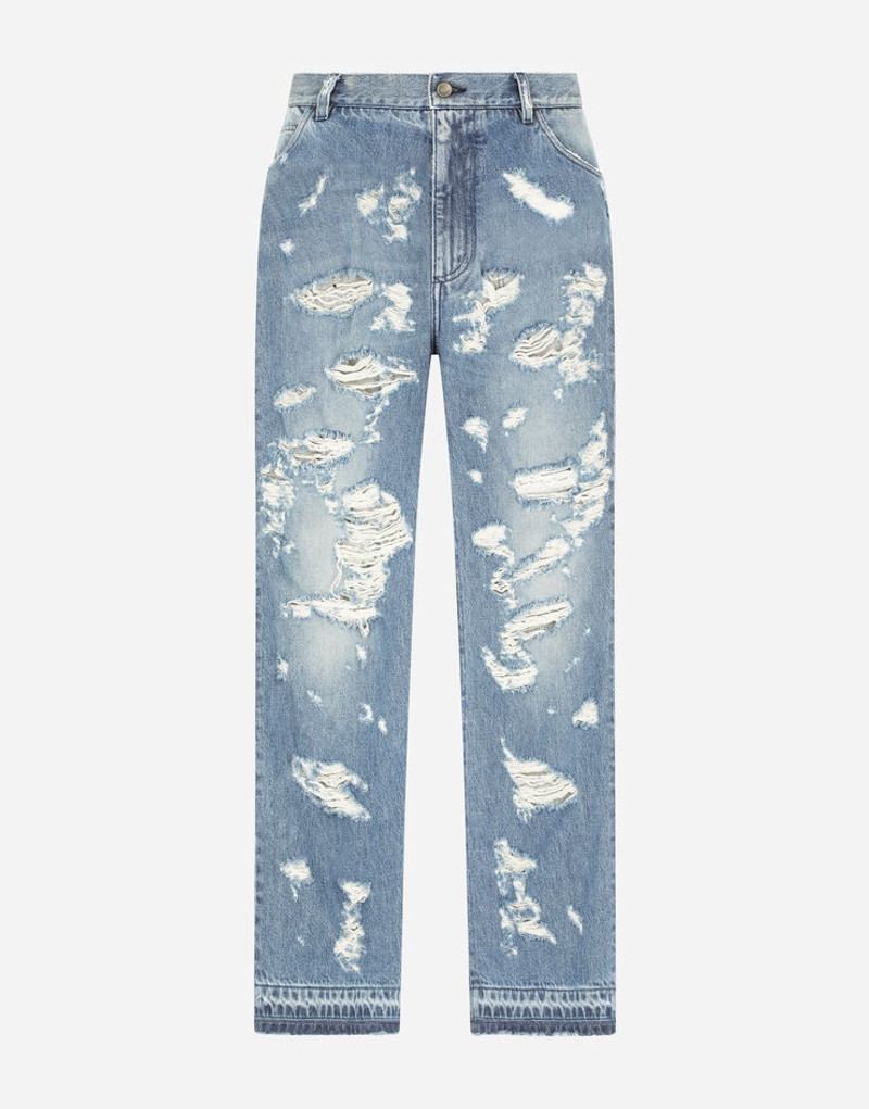 Oversize light blue wash jeans with rips 1