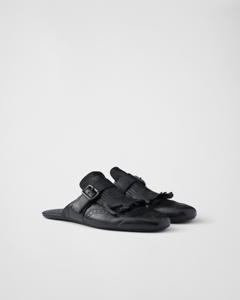 Fringed monk strap leather mules 1