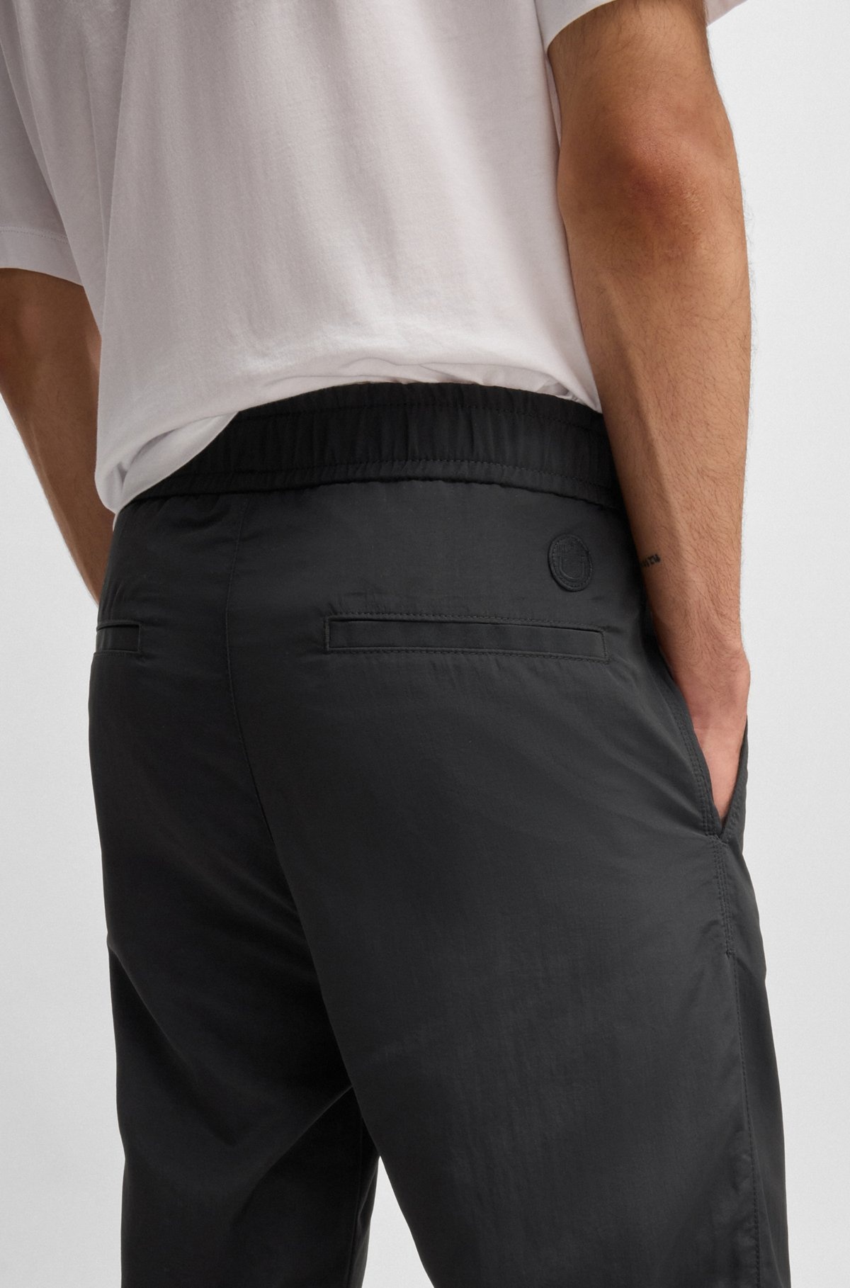 WATER-REPELLENT TROUSERS WITH ADJUSTABLE BELT - 5