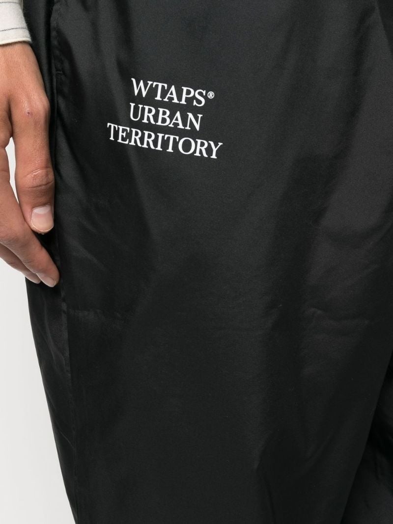 WTAPS Incom tapered track pants | REVERSIBLE