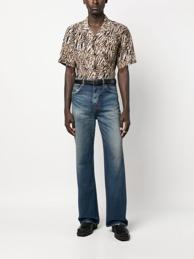 SAINT LAURENT 70's whiskering-effect bootcut jeans outlook