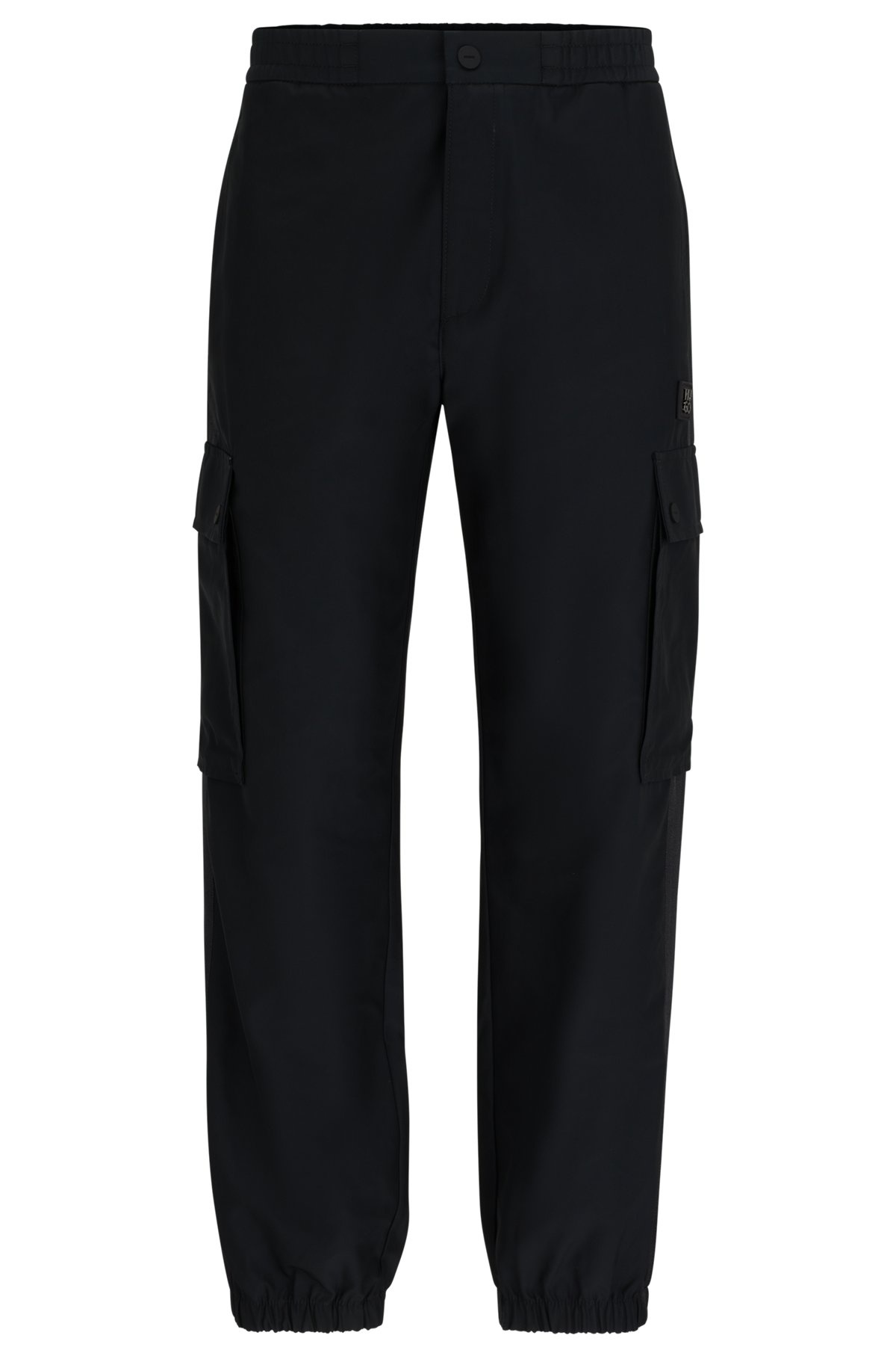 REGULAR-FIT TROUSERS IN WATER-REPELLENT MATERIAL - 1
