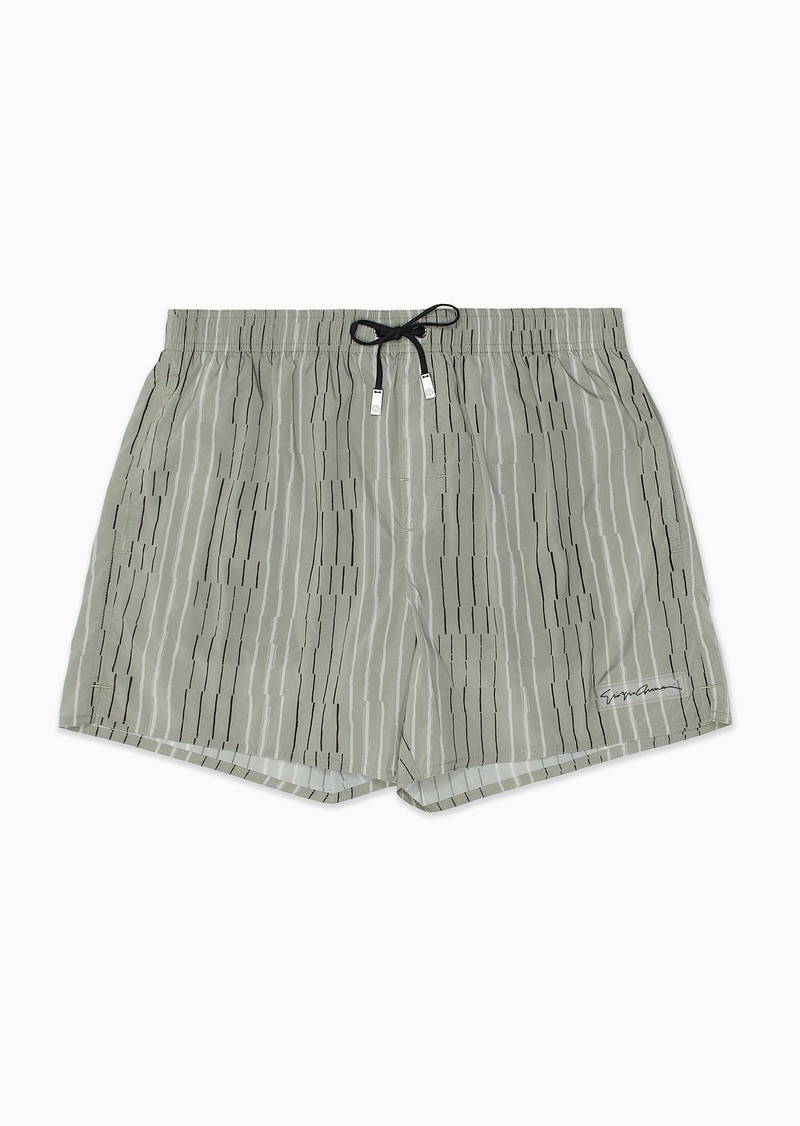 Irregular striped print swim trunks 1