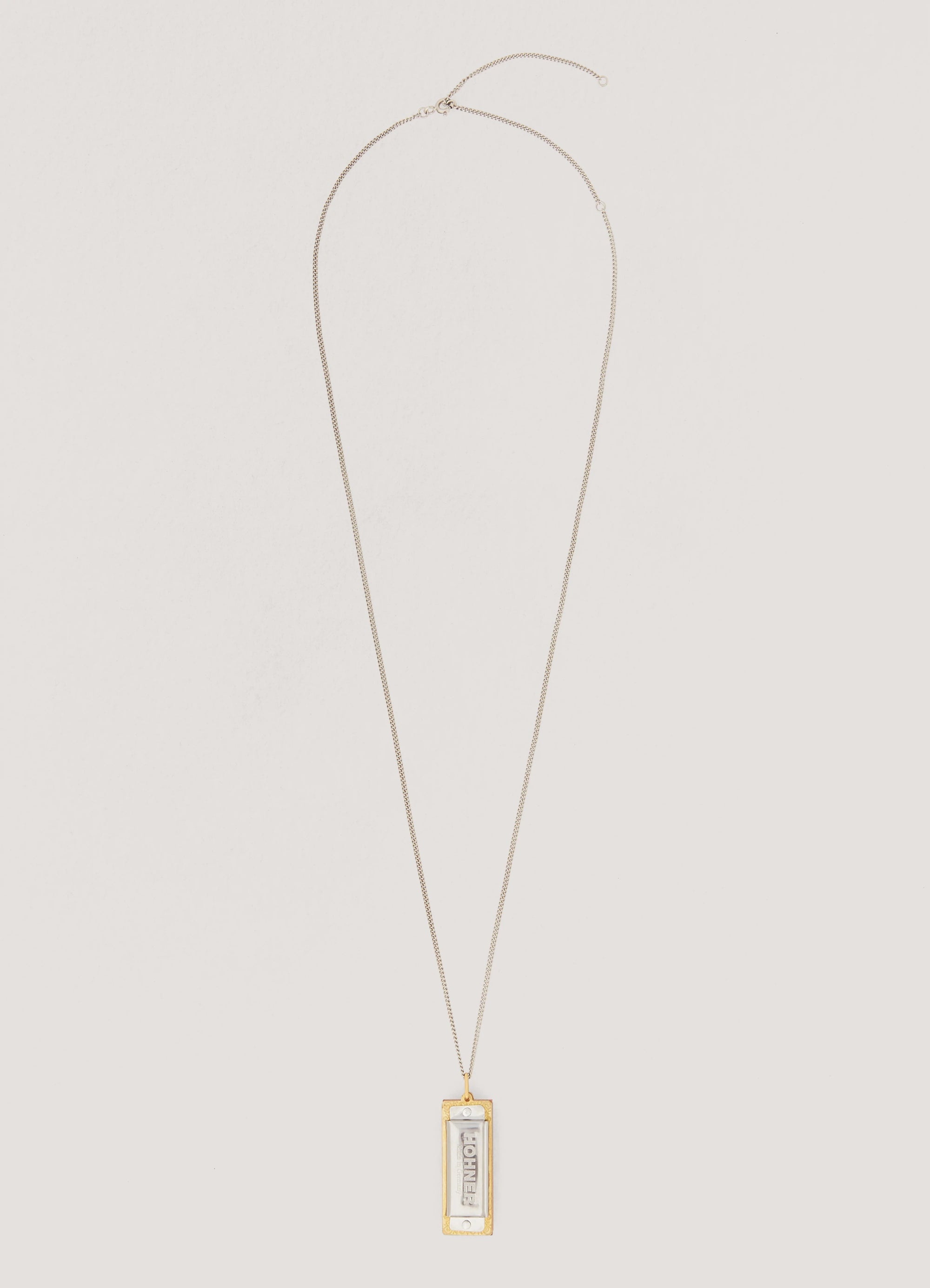 HARMONICA NECKLACE
BRASS - 1