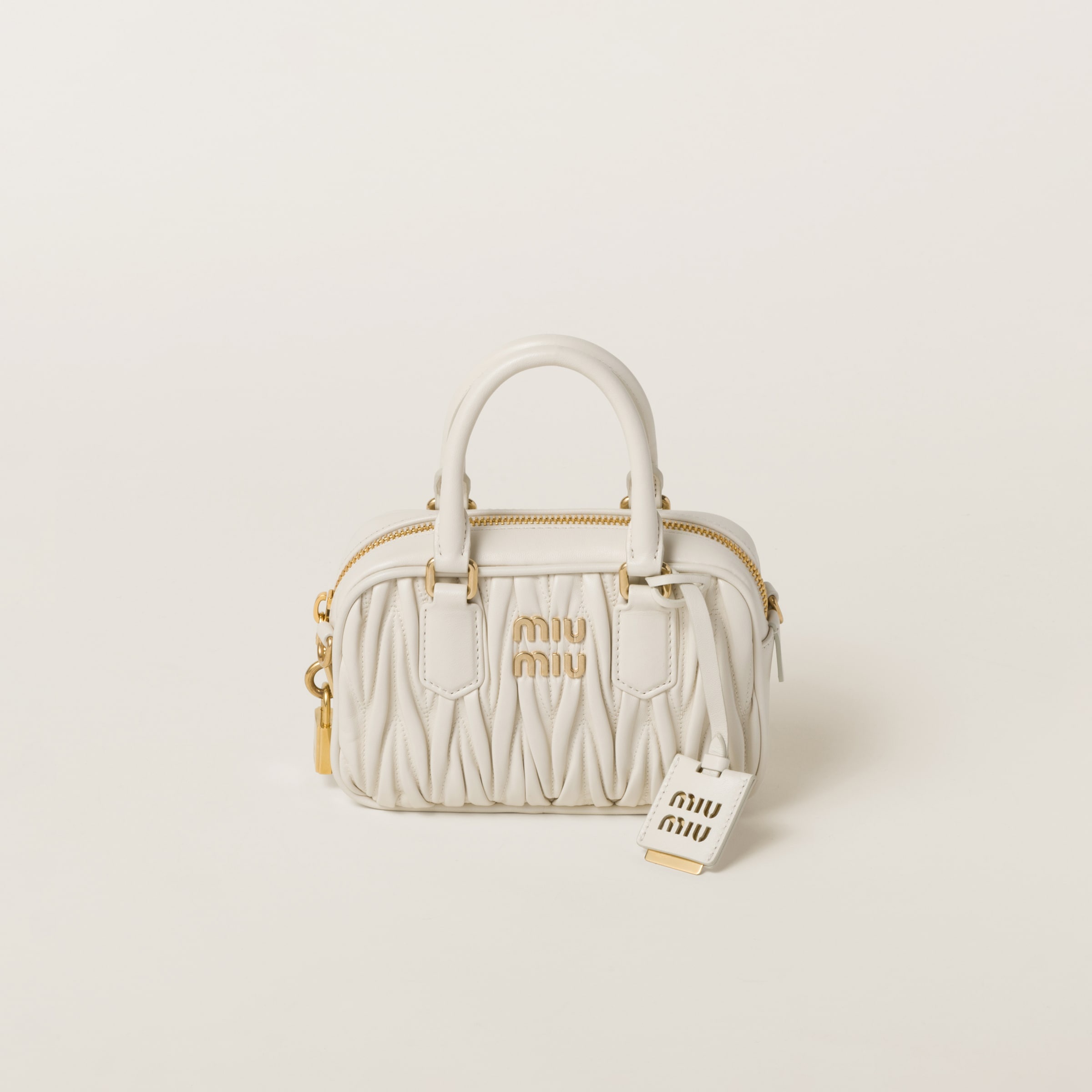 Miu Miu Matelassé nappa leather top-handle bag | REVERSIBLE