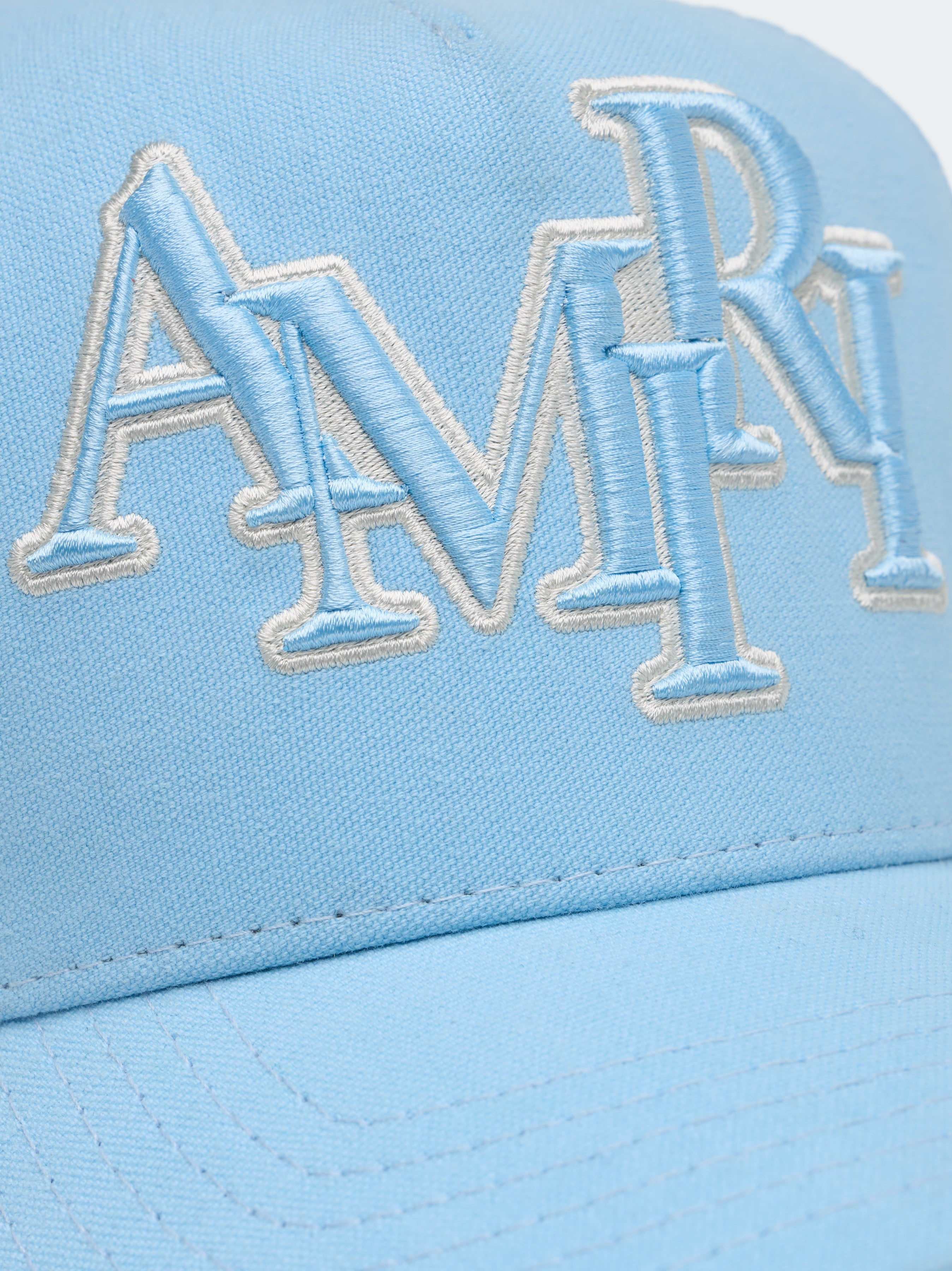 STAGGERED AMIRI LOGO TRUCKER - 4