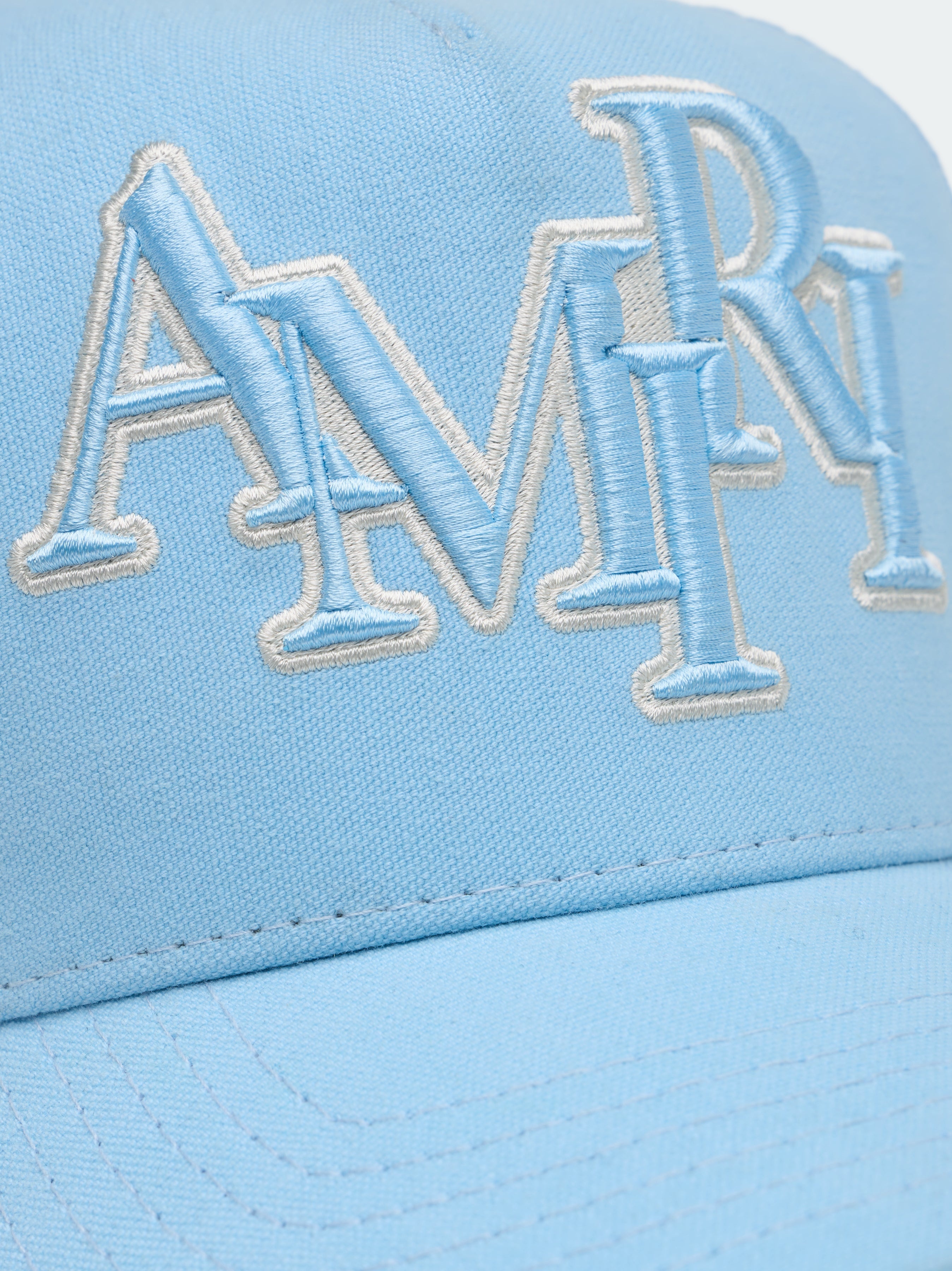 STAGGERED AMIRI LOGO TRUCKER - 4