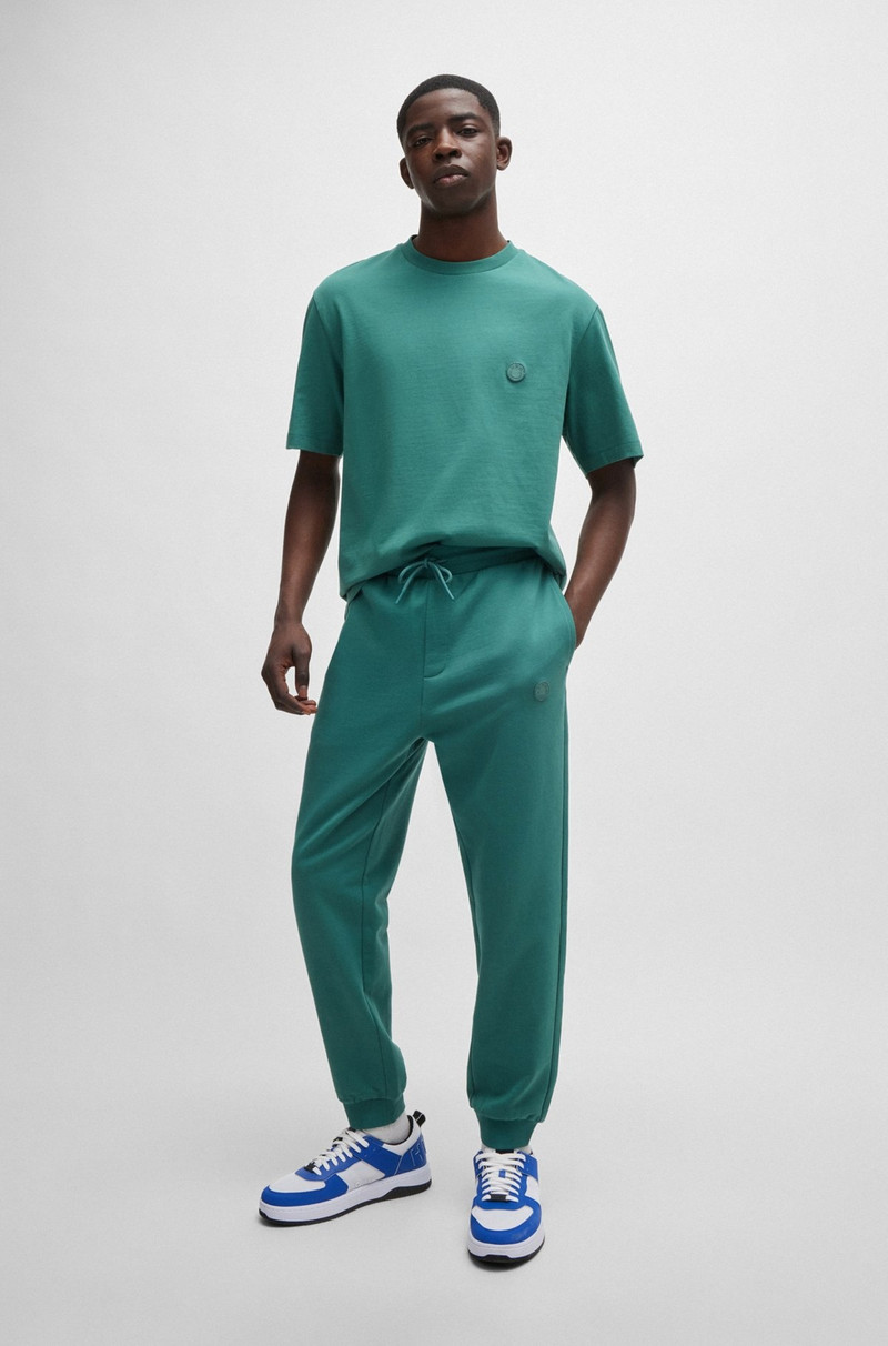 HUGO COTTON-TERRY TRACKSUIT BOTTOMS WITH HAPPY HUGO LOGO PATCH outlook