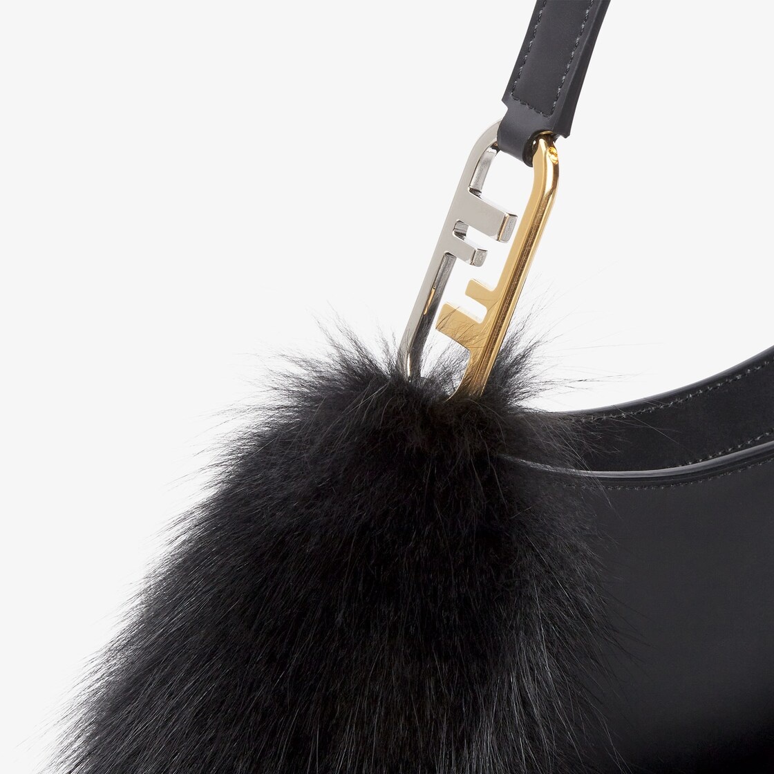 Pouch made of black leather, embellished with tone on tone fox fur and decorated with Fendi Roma let - 5