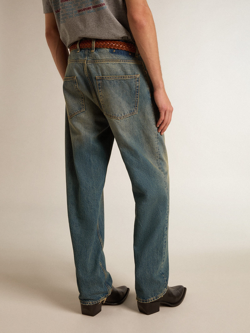 Blue jeans with a lived-in treatment 4