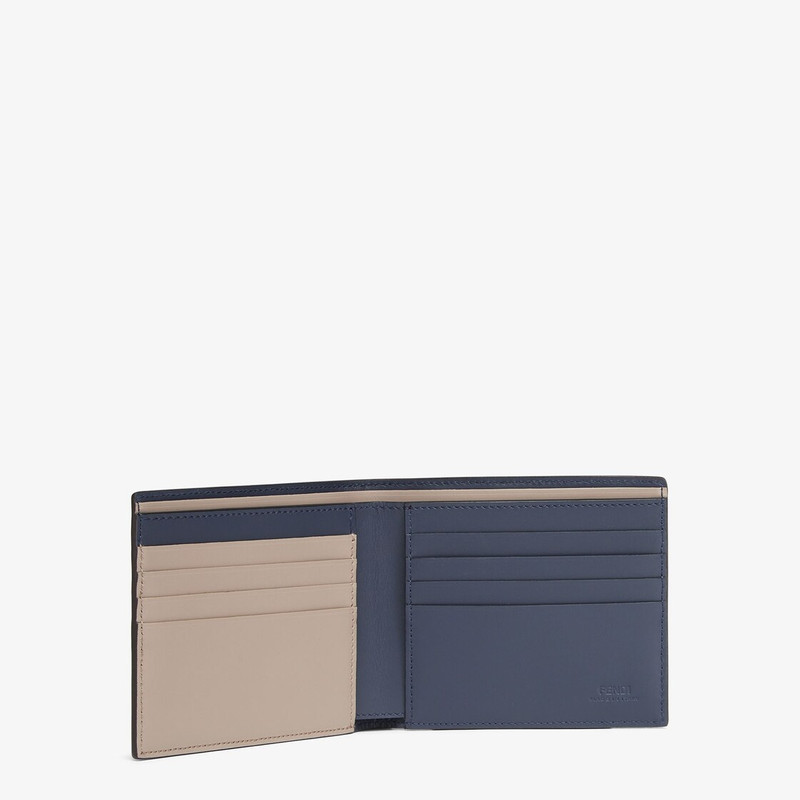 FENDI Wallet with eight interior card slots and two compartments for bills. Made of blue leather with FF m outlook