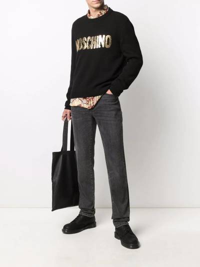 Moschino painted-logo long-sleeve jumper outlook