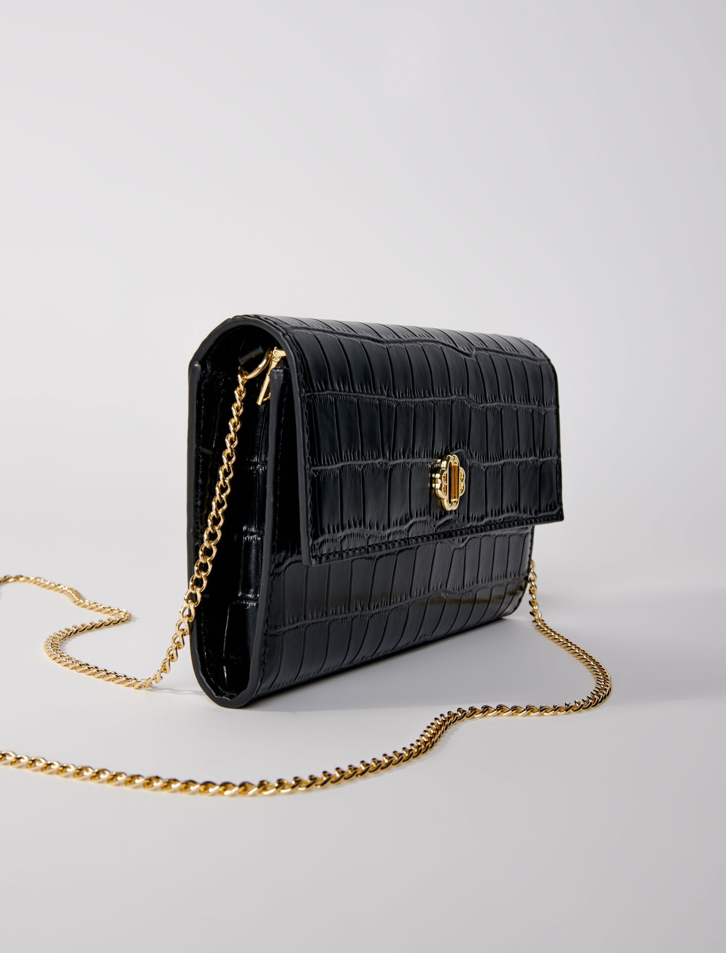 Croc-effect embossed leather bag 6