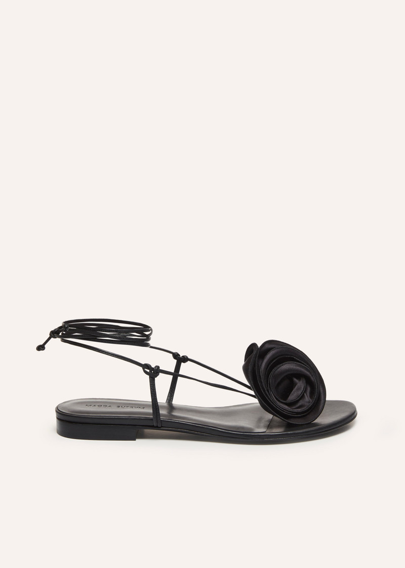 Wrap around flat flower sandals in black satin - 1