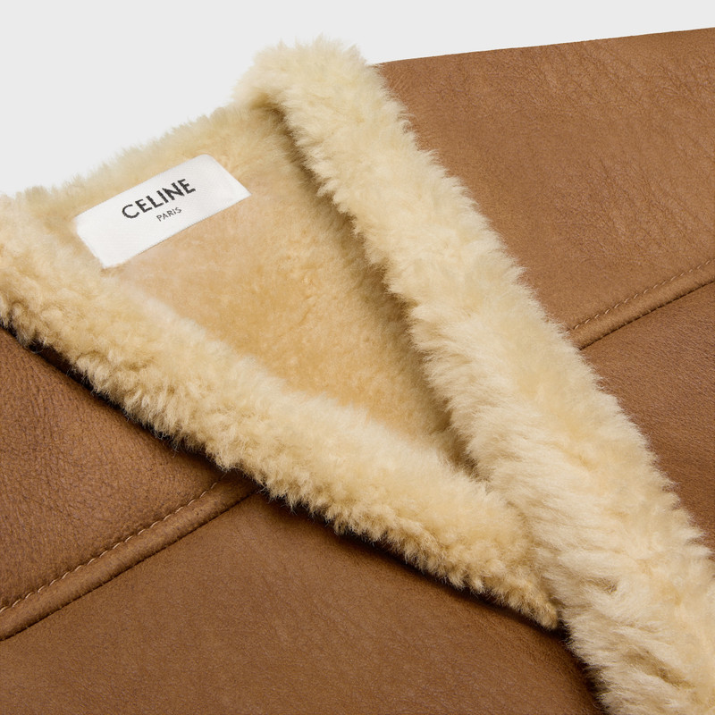 oversized sleeveless jacket in curly lambskin 3